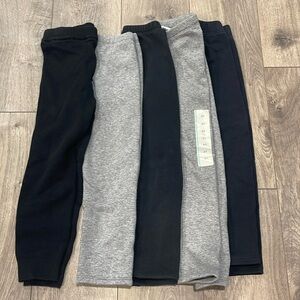 Lot of 5 pairs of Black and Gray fleece leggings in 4-4T.